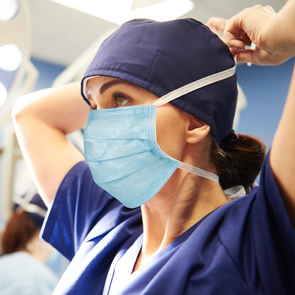 Healthcare Worker Wearing Tie-On Mask